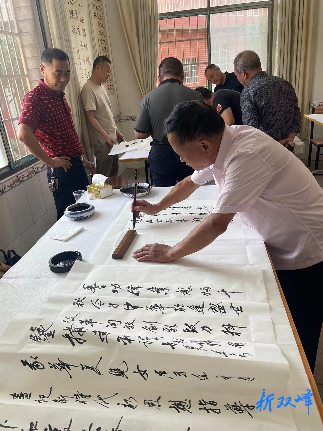 三塘铺镇举办迎国庆书法创作活动