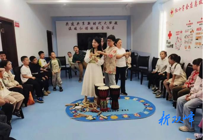 鼓韵粽情庆双节 土乔社区疗愈活动润童心