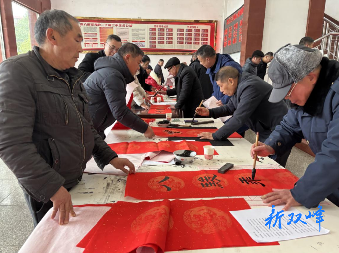 新春走基层丨三塘铺镇：小年送春联 墨香暖人心